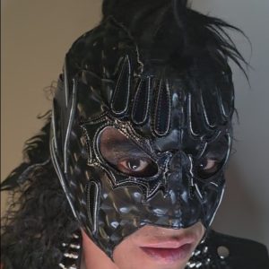 "Trauma II - Stealth Edition". Es una pieza con una estética Black Metal / Hardcore que se aleja de lo fantástico para entrar en un terreno mucho más crudo y agresivo. Al ser de "cara abierta", permite que la expresión real del luchador juegue un papel fundamental